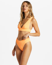 Load image into Gallery viewer, Woman wearing bikini in tangerine color from Billabong.