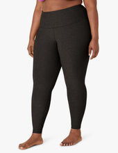 Load image into Gallery viewer, female model wearing beyond yoga leggings in darkest night color