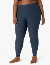 Load image into Gallery viewer, female model wearing beyond yoga leggings in nocturnal navy color