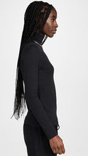 Load image into Gallery viewer, Female model wearing essential ribbed turtleneck from beyond yoga