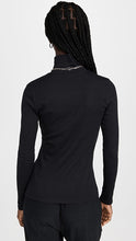 Load image into Gallery viewer, Female model wearing essential ribbed turtleneck from beyond yoga
