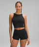 Woman wearing a black sports bra and black shorts from lululemon
