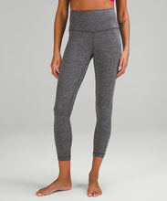 Load image into Gallery viewer, Image of a woman&#39;s legs, wearing grey lululemon leggings