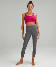 Load image into Gallery viewer, woman wearing a pink sports bra and grey yoga leggings from lululemon