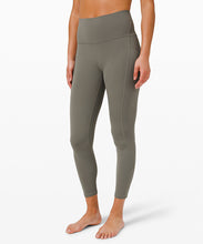 Load image into Gallery viewer, woman wearing yoga leggings from lululemon