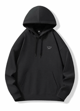 Load image into Gallery viewer, Black hoodie with a logo on a white background
