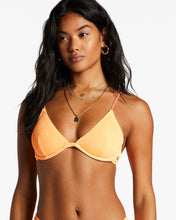 Load image into Gallery viewer, Woman wearing a tangerine bikini from Billabong.