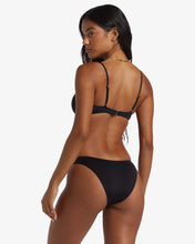 Load image into Gallery viewer, Woman wearing a black bikini from Billabong. 