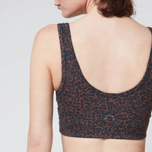 Load image into Gallery viewer, Female model wearing &quot;Let&#39;s Move Kellam&quot;  Bronze Distorted Cheetah print sports bra from Varley 