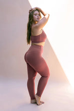 Load image into Gallery viewer, Female model wearing Fig colored leggings from Girlfriend Collective