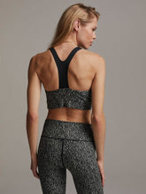 Load image into Gallery viewer, Female model wearing Textured Grain Bassett Bra from Varley