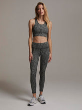 Load image into Gallery viewer, Female model wearing textured grain century leggings from Varley