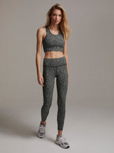Load image into Gallery viewer, Female model wearing textured grain century leggings from Varley