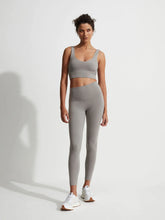 Load image into Gallery viewer, female model wearing gray flannel Always Edwards Bra from Varley