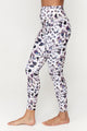 Female model wearing pink leopard print leggings from spiritual gangster