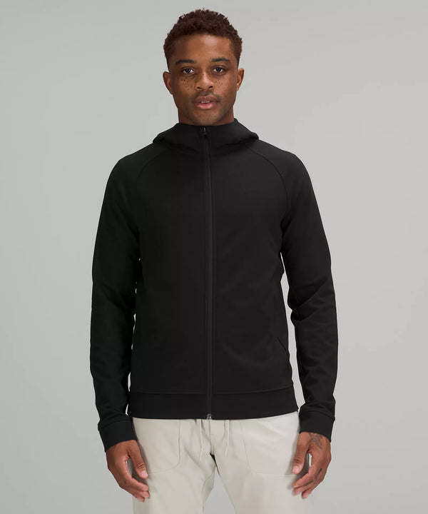 Male model wearing full zip black hoodie