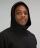 Male model wearing full zip black hoodie