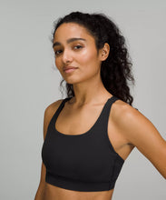 Load image into Gallery viewer, Female model wearing black sports bra