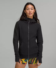 Load image into Gallery viewer, Female model wearing black full zip hoodie
