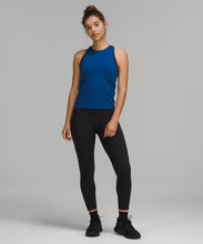 Load image into Gallery viewer, Female model wearing black leggings with blue tank from lululemon