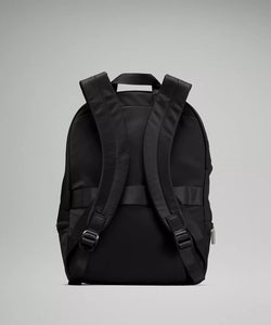 Backside of black backpack