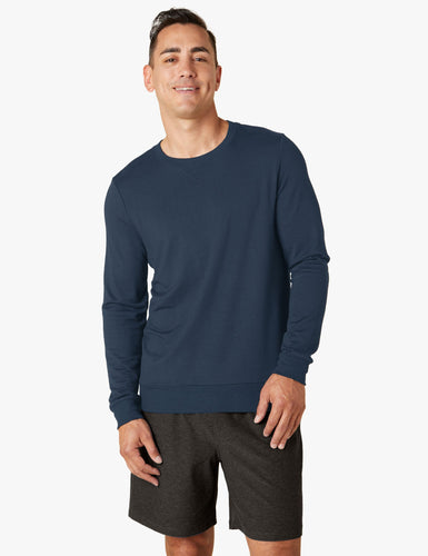 male model wearing navy blue long sleeve shirt
