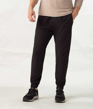 Load image into Gallery viewer, male model wearing black athletic jogger pants