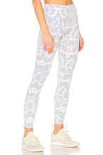 Load image into Gallery viewer, Female model wearing nocturnal leopard print gray leggings from Onzie