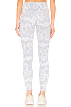 Load image into Gallery viewer, Female model wearing nocturnal leopard print gray leggings from Onzie