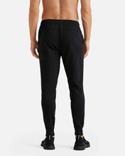 Load image into Gallery viewer, Male model wearing black athletic joggers