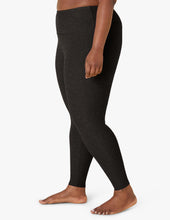 Load image into Gallery viewer, female model wearing beyond yoga leggings in darkest night color