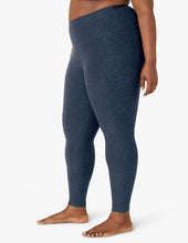 Load image into Gallery viewer, female model wearing beyond yoga leggings in nocturnal navy color