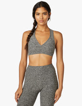 Load image into Gallery viewer, female model wearing gray sports bra from beyond yoga
