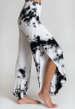 Load image into Gallery viewer, Female model wearing black and white tie dye loose pants from Jala Clothing