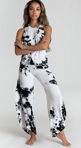 Female model wearing black and white tie dye loose pants from Jala Clothing