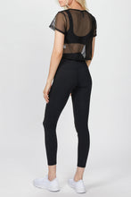 Load image into Gallery viewer, Female model wearing black Nita leggings from Varley