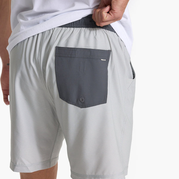 close up of the back pocket of a man wearing vuori shorts