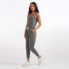 Load image into Gallery viewer, Female model wearing gray jumpsuit from Vuori