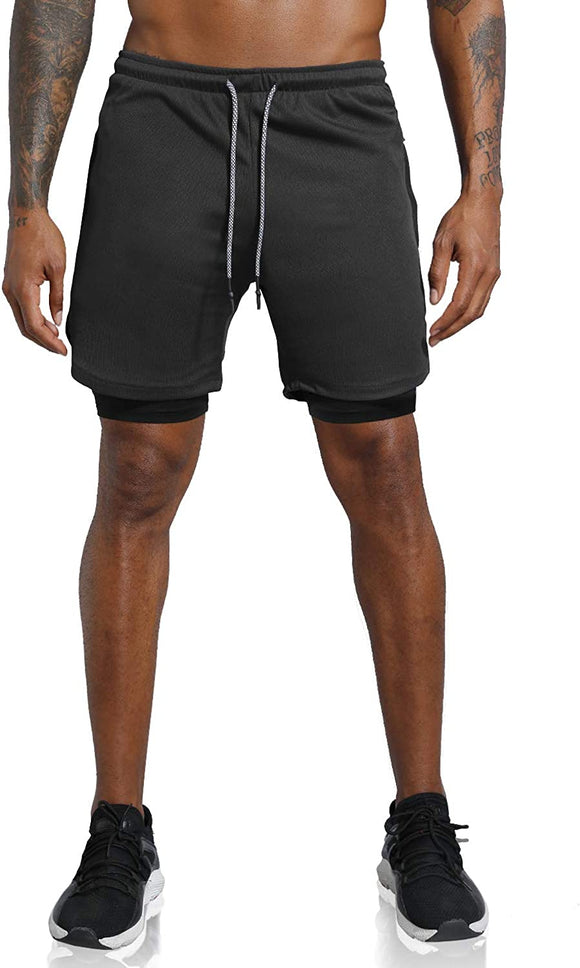 black male model wearing black athletic shorts