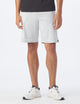 male model wearing light grey athletic shorts